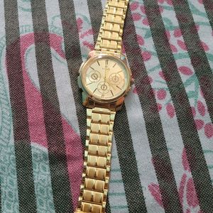 Titan Watch Good Condition golden Colour