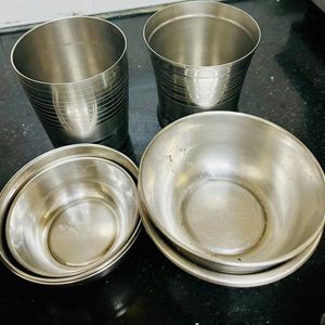 Set of 10 bowls, spoons, 2 plates, glasses