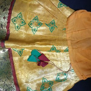 Pattu Pavadai Green And Gold Color Mixed