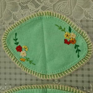 A Set of 3 hand embroidered table mats