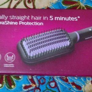 A BRAND NEW PHILIPS HAIR STRAIGHTENER.