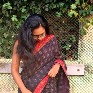 Black and Red Saree With Golden Print