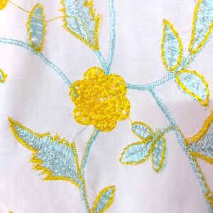 White Top With Yellow And Light Blue Embroidery