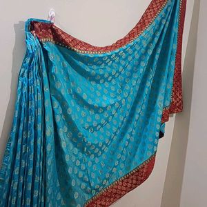 Banarasi SkyBlue Maroon And Gold With Stone Saree