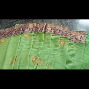 Eligent Green Saree With Peacock Pattern