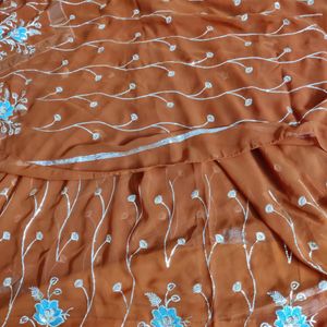 Beautiful Design Light Rust Color Saree