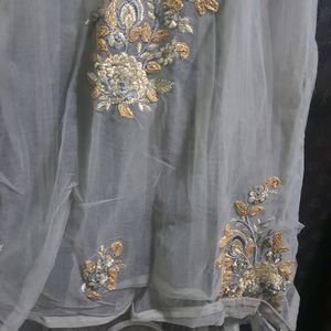 Grey Lehnga And  Padded Choli Full Net Work Lehnga 3 Layer Of Net With Good Look And Simple Matching Greay Duppta