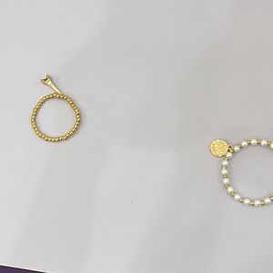 3 Beaded Pearl Bracelets With Charms