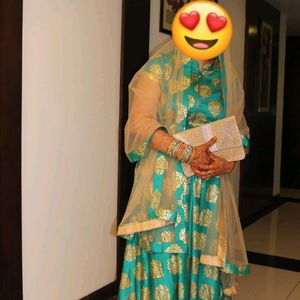 Eye Catching Sea Green Gown With Dupatta