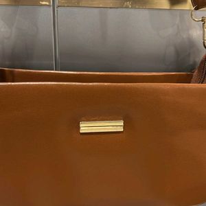 TAN HANDBAG