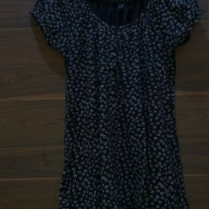 Black top with white circle print