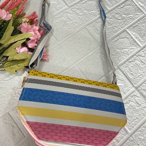 Multicoloured hexagonal sling bag