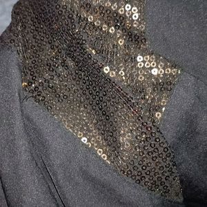 Gothic black top with sequined shoulders