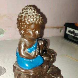 Budha Idol With Dipsticks