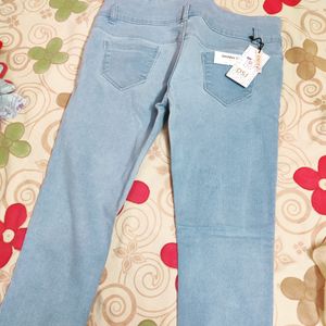 A Brand New Denim Jeans With 3 Solid Buttons