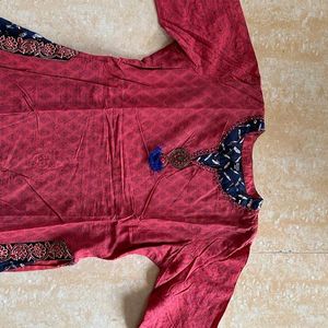 A light Festive Red Kurta Plazo Set