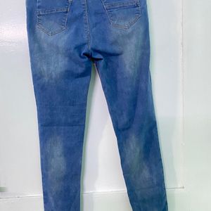 LIGHT BLUE RIPPED JEANS FOR WOMEN