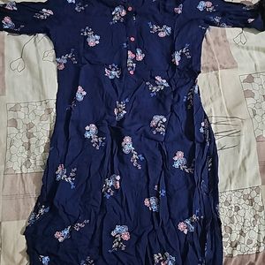 Its Navy Blue Top With Some Multi Colour Flowers