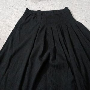 Black Long Pleated Skirt With Leather Straps