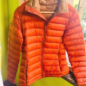 Orange puffer packable jacket