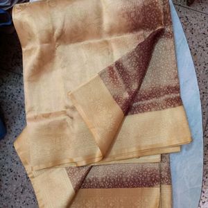 Golden Zari Knitting Work On Brown Base saree