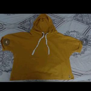 Yellow Solid Knitted Regular Crop Top Has A Hood