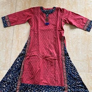 A light Festive Red Kurta Plazo Set