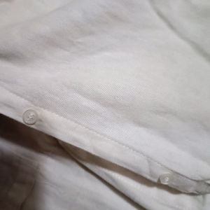 White Shirt There Are Some Stains Which Can Be Was