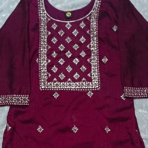 A Traditional Meroon Color Kurta (Womens Wear)