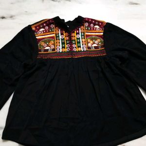 A Black Top With Good Or Excellent Quality