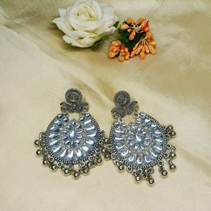 silver colour earrings