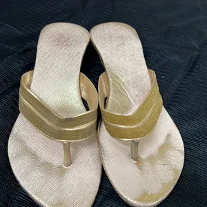 Golden Sandal With Very Little Heal