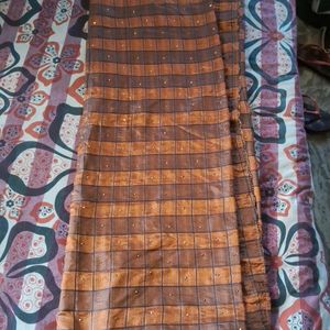 Attractive Checkered Brown Lace Border Saree