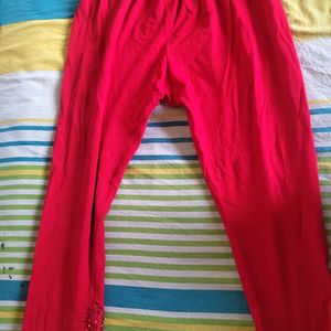 Red Leggings A Little Below Knee Length With Work