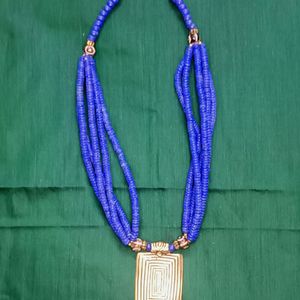 Royal Blue Necklace With Gold Brass Pendant.