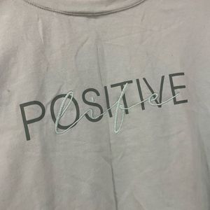 “Positive” crop tee