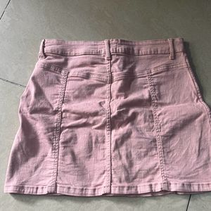 Pink Scirlt With Buttons In Front