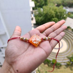 Orange Ganeshji Resin Rakhi