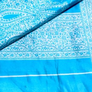 A Blue Silk Saree With Blouse And Peticoat