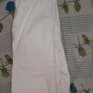 White Straight Pant With Embroidery Work At Bottom