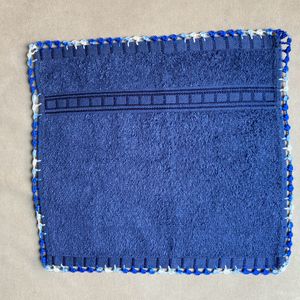 A Hand Napkin With Crochet Border