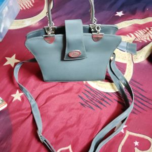 Grey Colour Handbag With Metal Handle