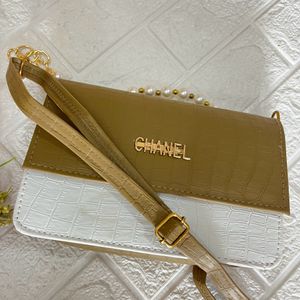 Olive green pearl handle sling bag