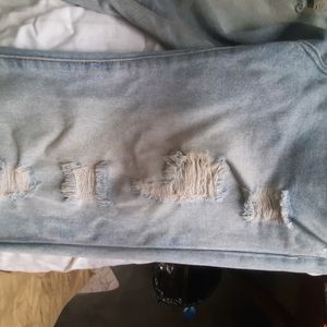 Distressed Light Blue Ripped Jeans