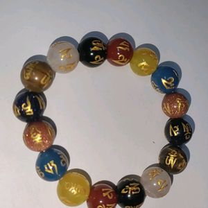 Om Mani Seven Chakra Round Bead Bracelet.