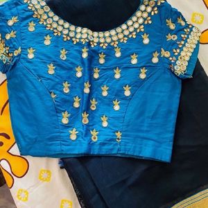 Blue Work Blouse And Black Saree