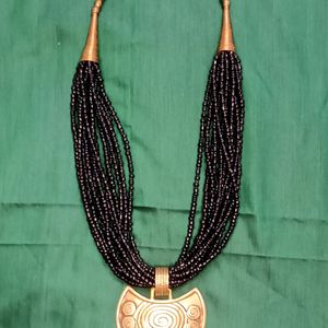 Black Beaded And Gold Brass Necklace.