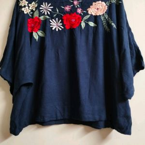 Blue Top With Embroidery On Neck