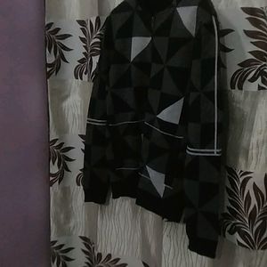 A Black Colour Wollen Jacket Large In Size