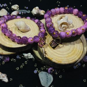 purple marble beads with cute chams.